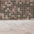 doccia con sassi bagno mosaico